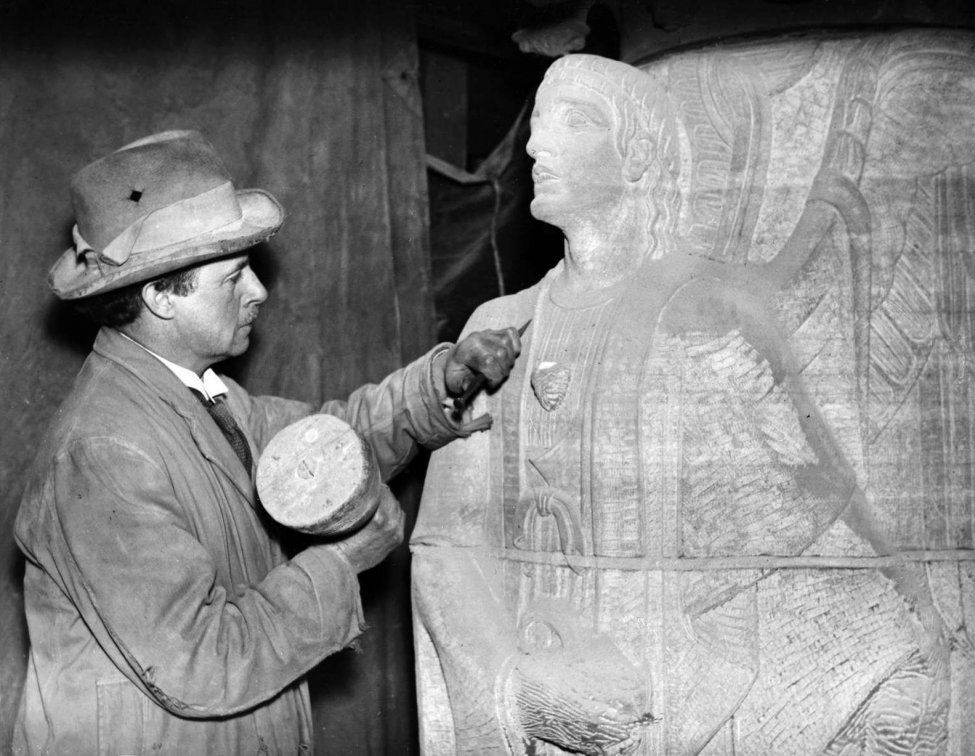 A sculptor working on a sculpture of an angel for the Anglican Cathedral in Liverpool.jpg A sculptor working on a sculpture of an angel for the Anglican Cathedral in Liverpool.jpg